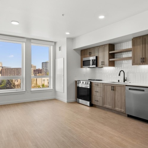 a kitchen with wooden floors