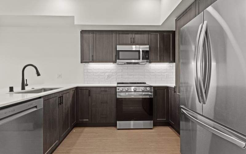 a kitchen with stainless steel appliances