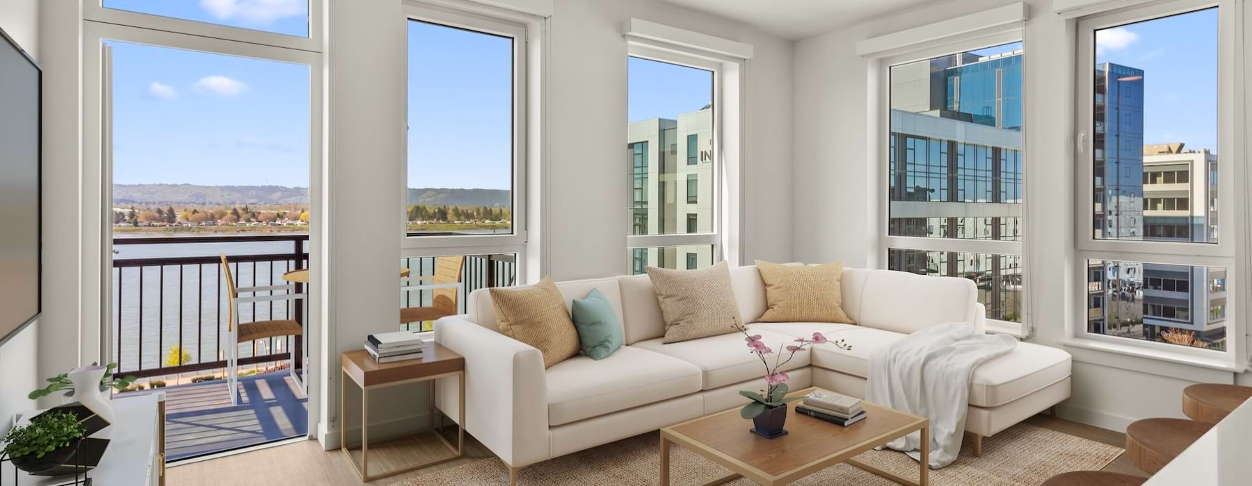 a living room with large windows