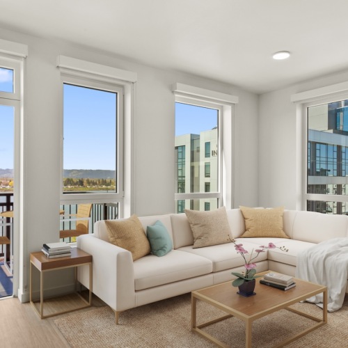 a living room with large windows